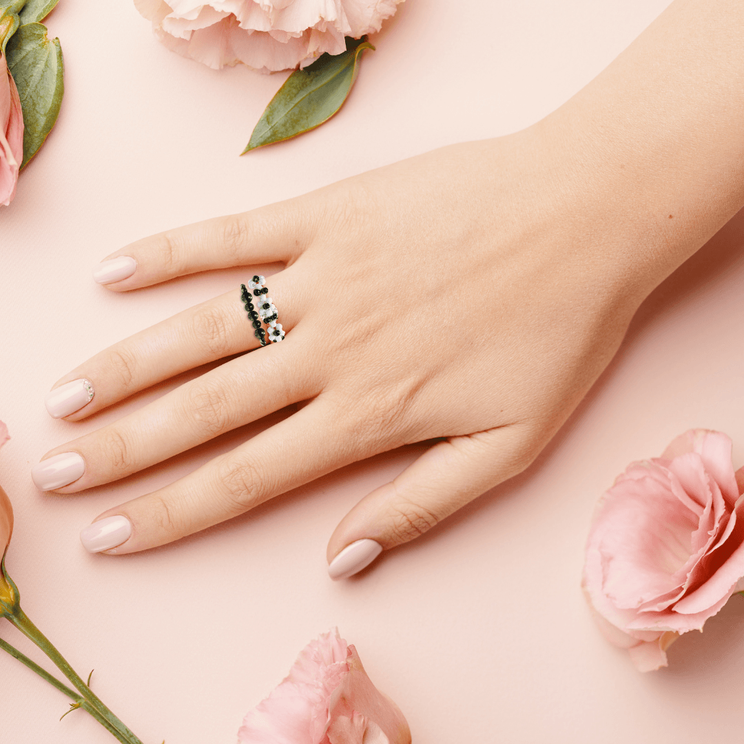 Shungite and flower ring bundle, bringing style and protection to a woman's hand