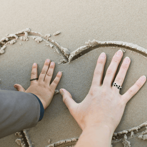 A woman and a boy both protected by the shungite and flower ring bundle