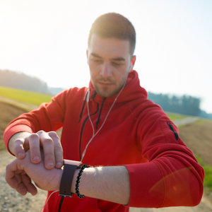 8mm shungite bracelet on man, paired perfectly with a smartwatch