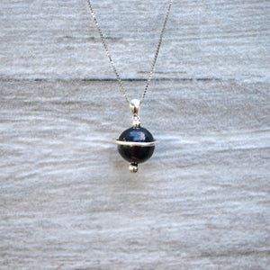 Shungite Orbit Pendant with a 10mm shungite bead, on a sterling silver chain 