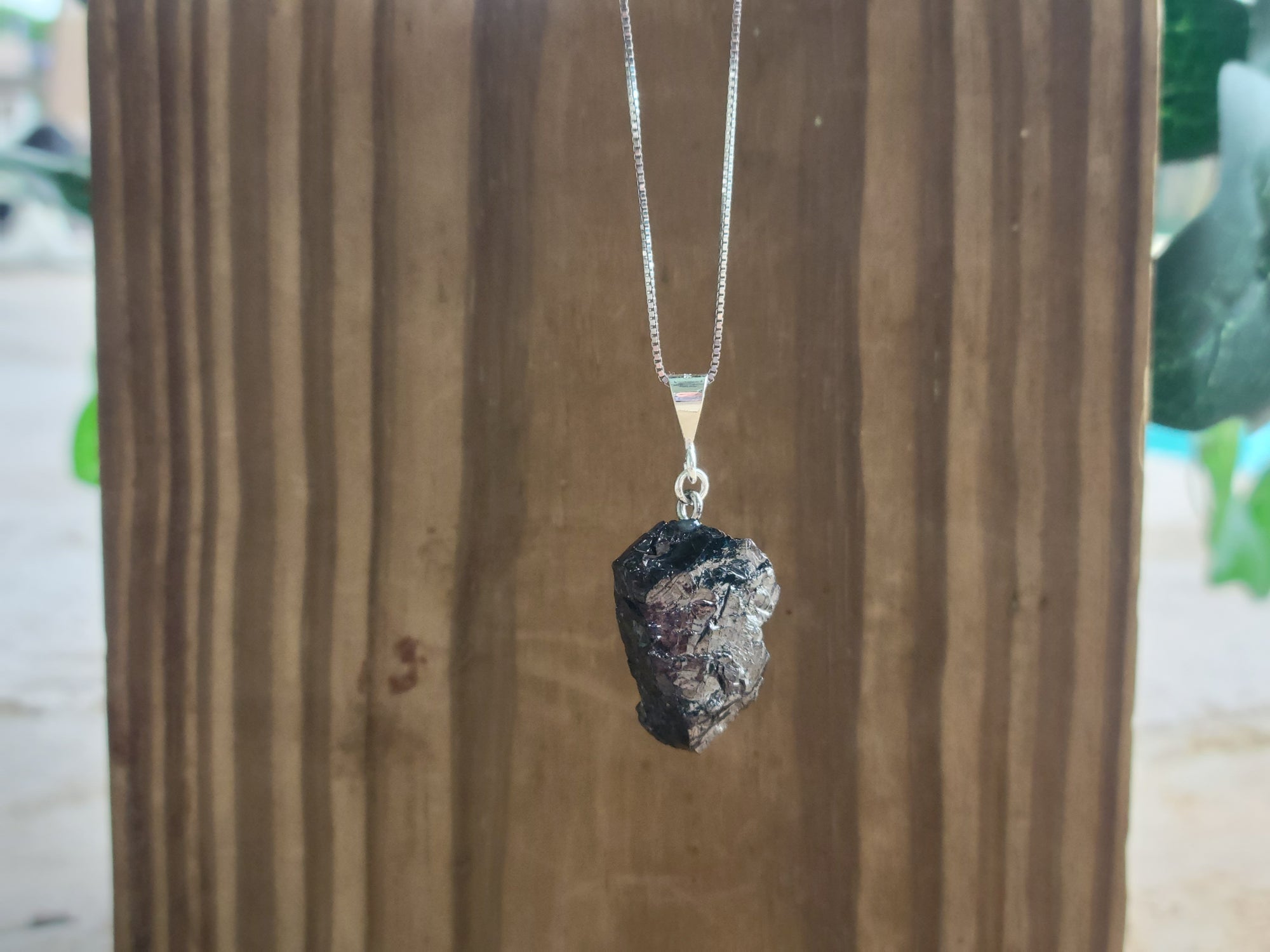 Elite Noble Raw Shungite Pendant on a sterling silver chain with 99% carbon for maximum EMF protection 