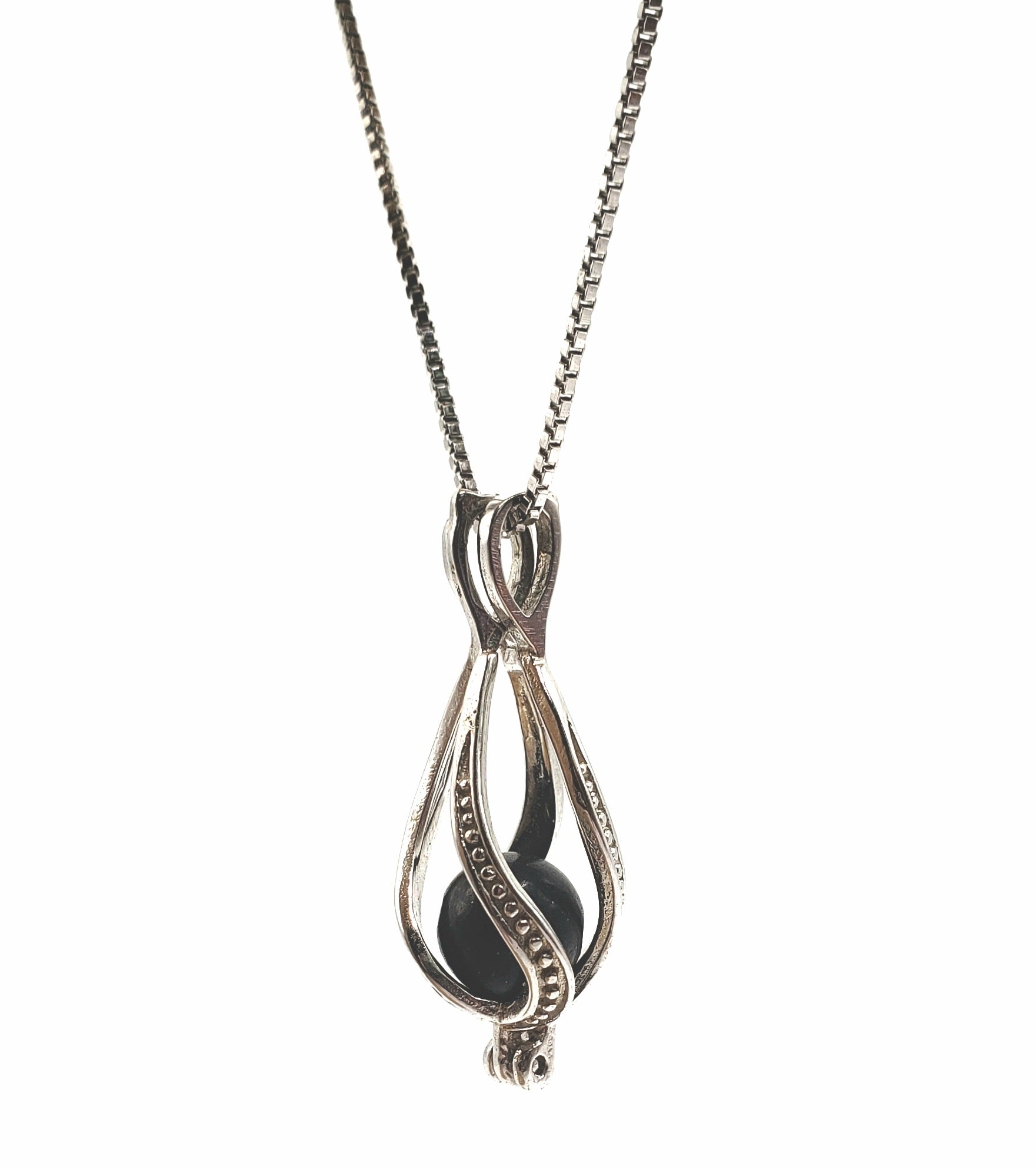 Sterling silver cage necklace with a 6mm shungite stone known for purifying negative energy and emotions