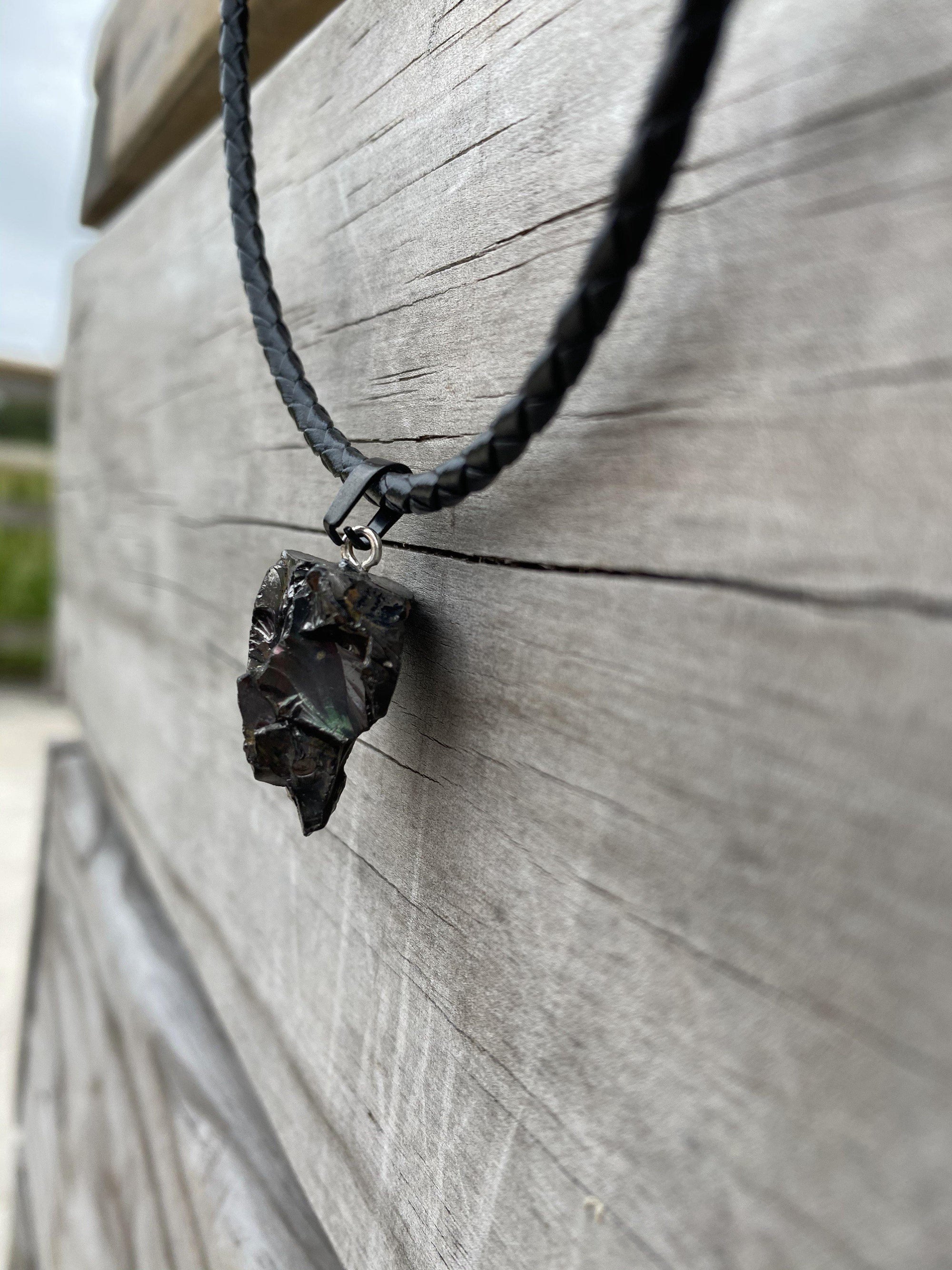 Elite Noble Raw Shungite Pendant on a braided leather cord with 99% carbon for maximum EMF protection 