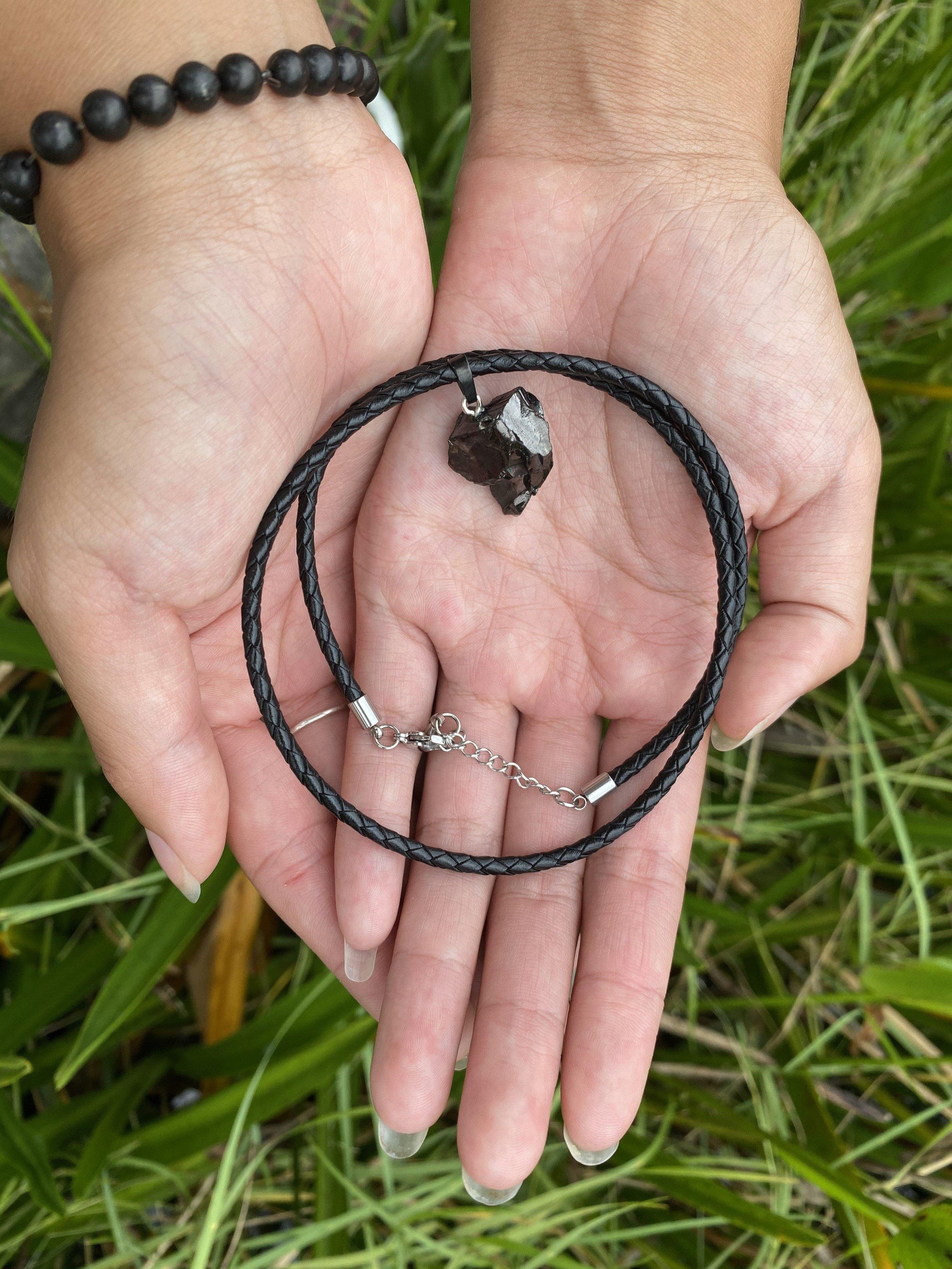 Elite Noble Raw Shungite Pendant on a braided leather cord with 99% carbon for maximum EMF protection 